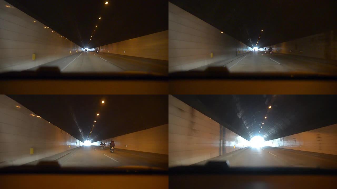 汽车穿过隧道行驶车窗外汽车第一视角