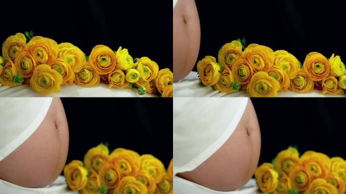 孕妇与黄玫瑰坐在一起