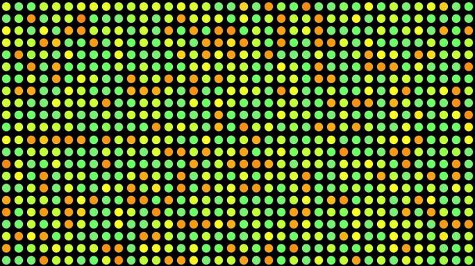 黄色、绿色和橙色多色圆圈音乐视频背景-黑色背景上具有随机生成效果的点网格