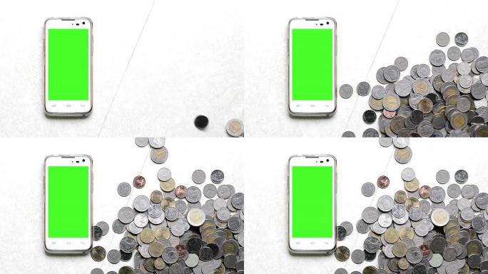 硬币增加和智能手机的绿屏。