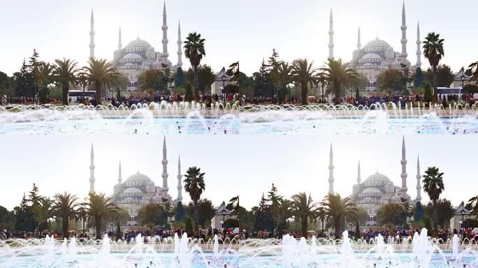 来自公共场所的伊斯坦布尔蓝色清真寺，有喷泉和游客