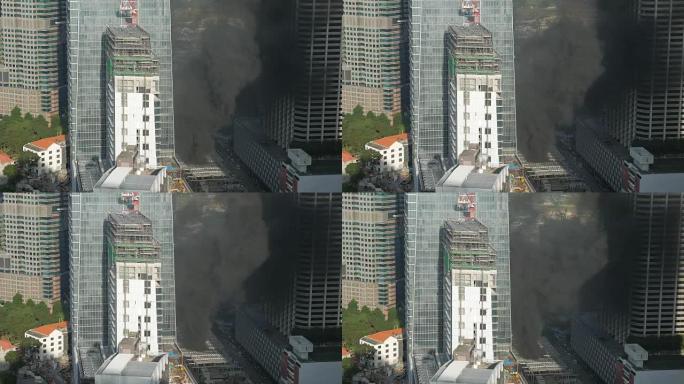 高层建筑冒出浓烟写字楼期货在建工地失火浓