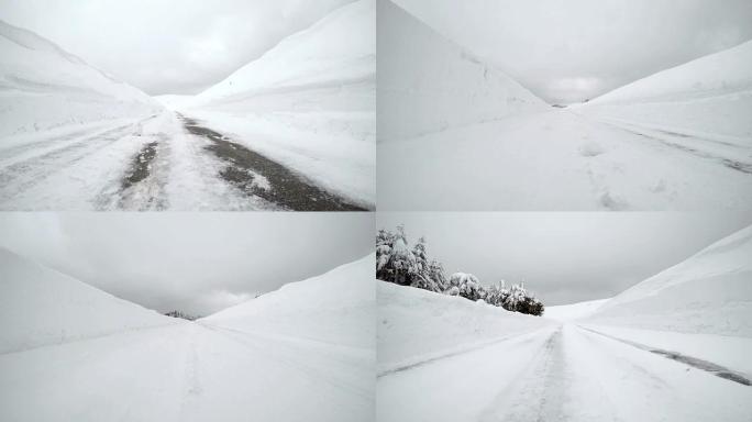 在白雪皑皑的冬季道路上行驶