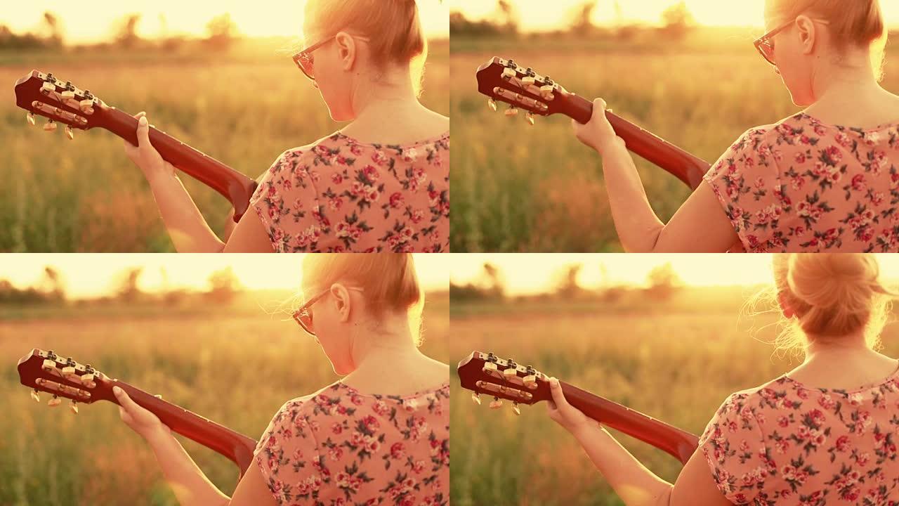 女孩在大自然中弹吉他