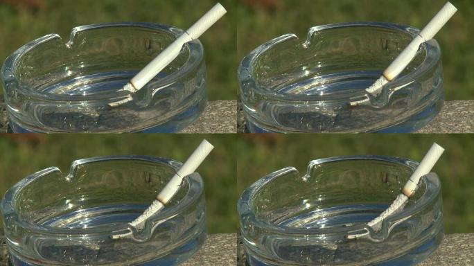 烟灰缸里的香烟实拍视频素材