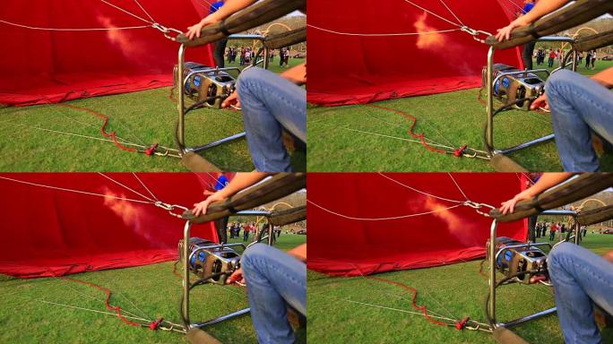 热气球充气特写镜头喷射草地草坪