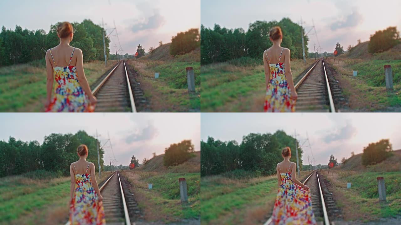 走在铁路上的年轻女子