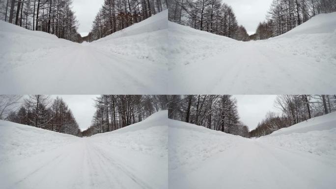 雪地冬季公路行驶行驶车窗外汽车第一视角
