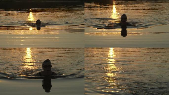 日落游泳运动员