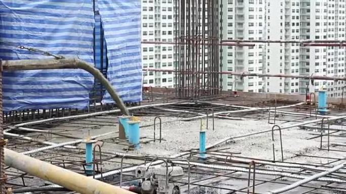 Pouring concrete mix from mixer。