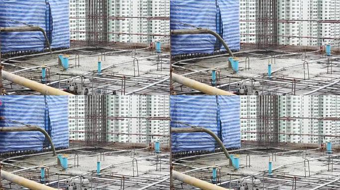 Pouring concrete mix from mixer。