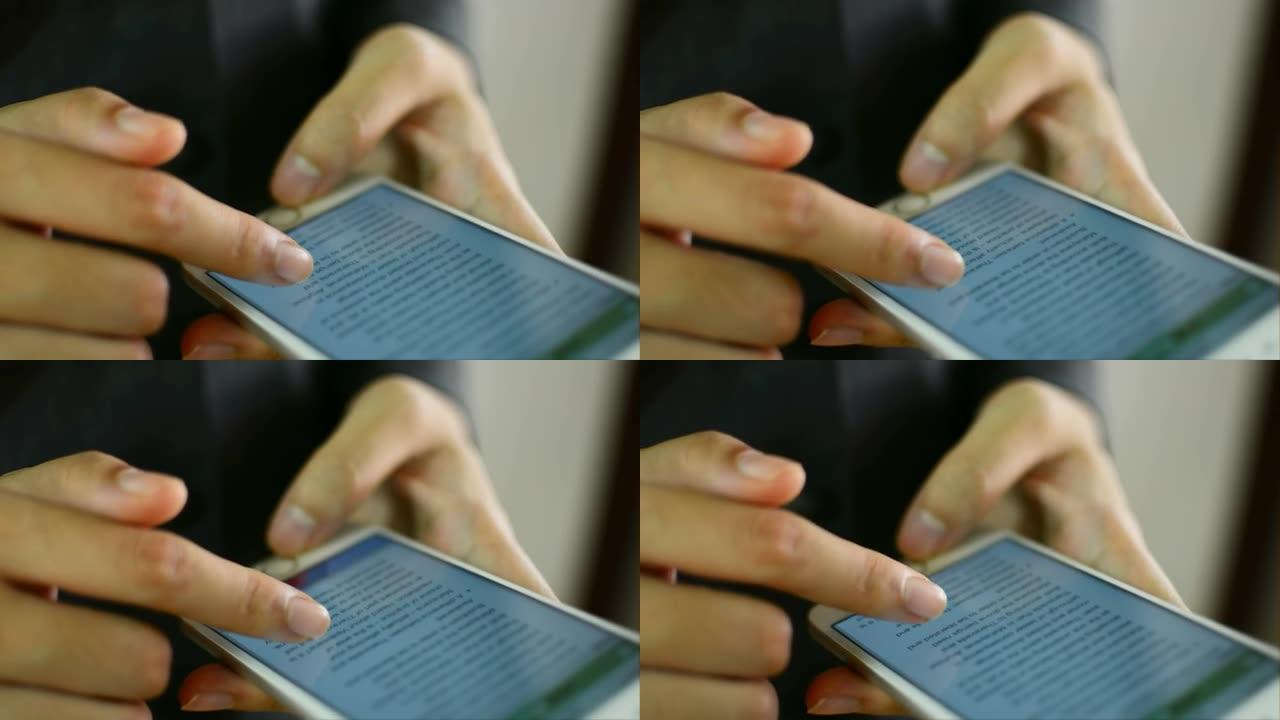 商务女性使用智能手机触摸屏色度键。