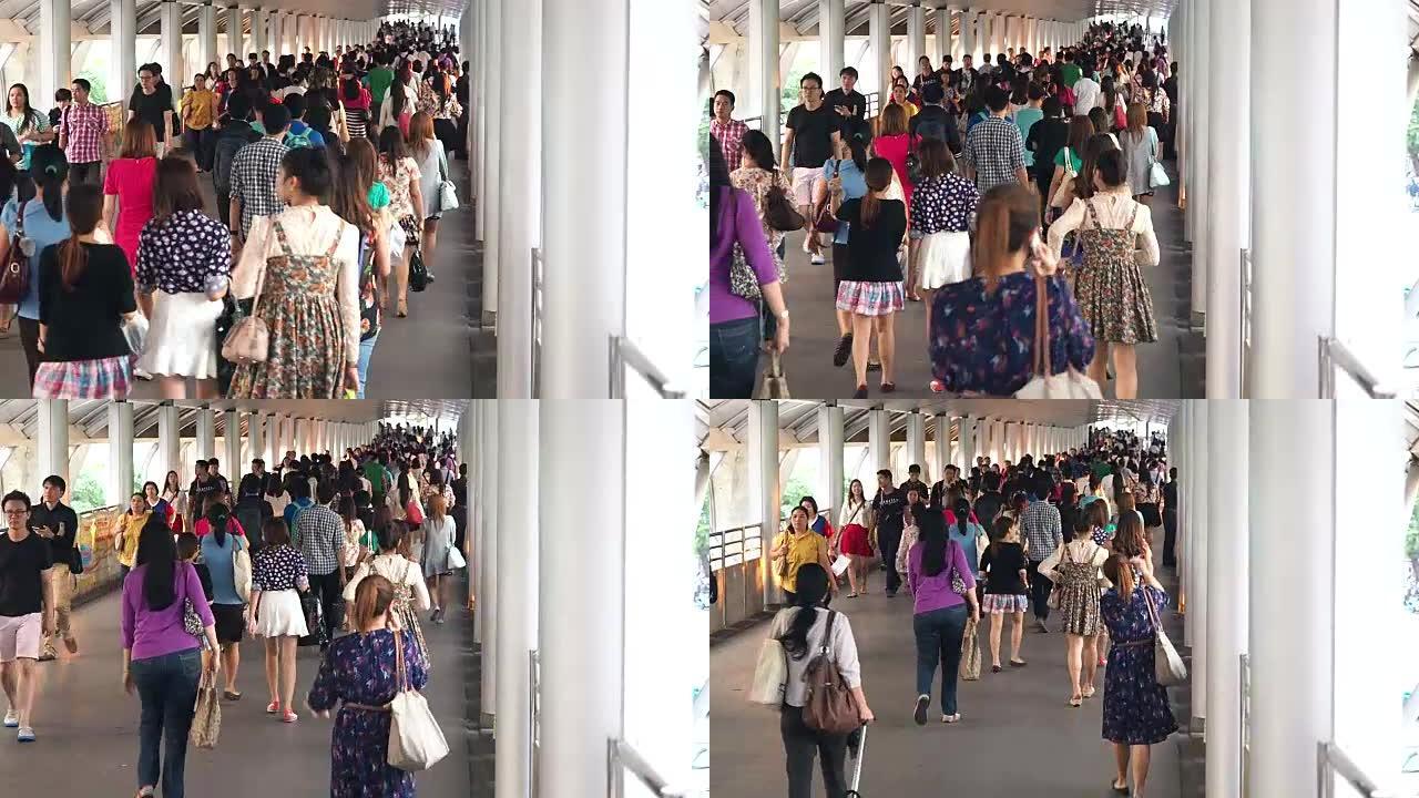 大量的人步行前往曼谷的空中火车，地铁或地铁站