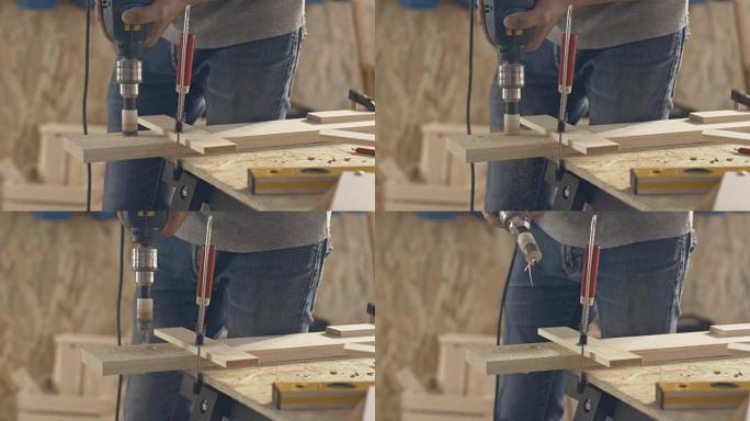 木匠在木头上钻孔开孔器工装家装木料生产加