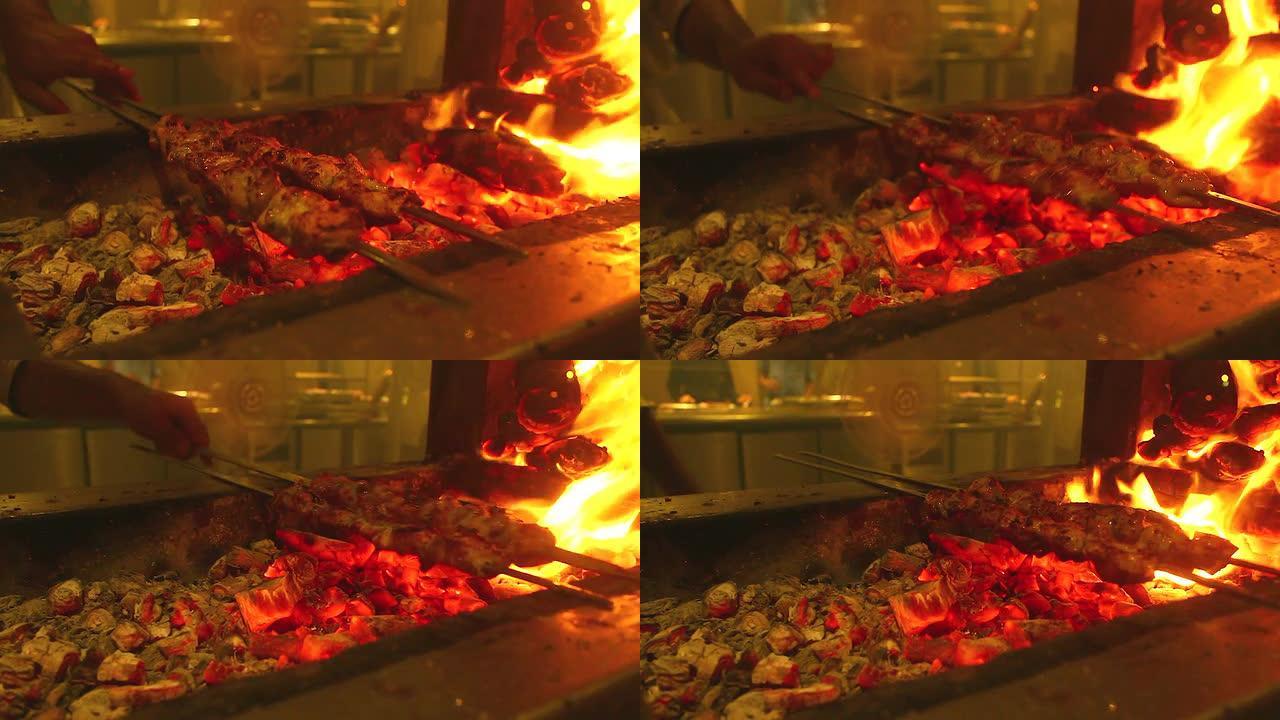 高清: 壁炉框架背景中烧烤中的木炭燃烧。