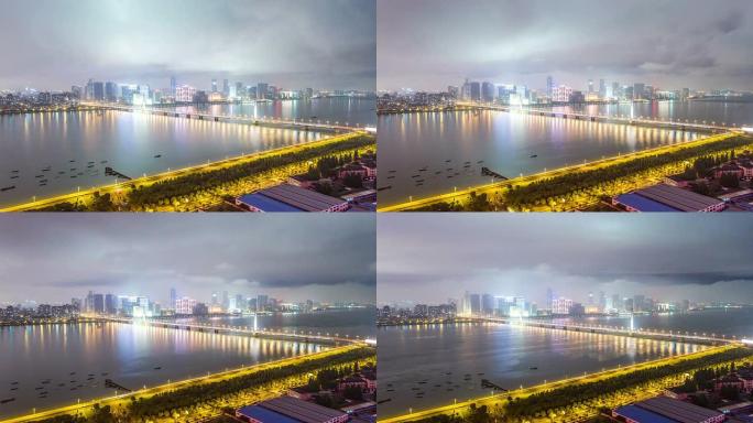夜间，杭州河岸的天际线和现代建筑，时间流逝。