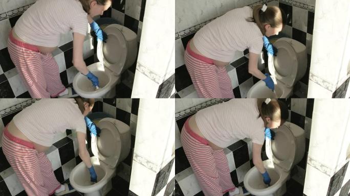 孕妇用马桶刷清洗马桶
