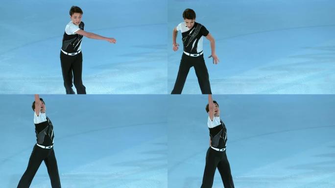 SLO MO男花样滑冰运动员举起手结束表演