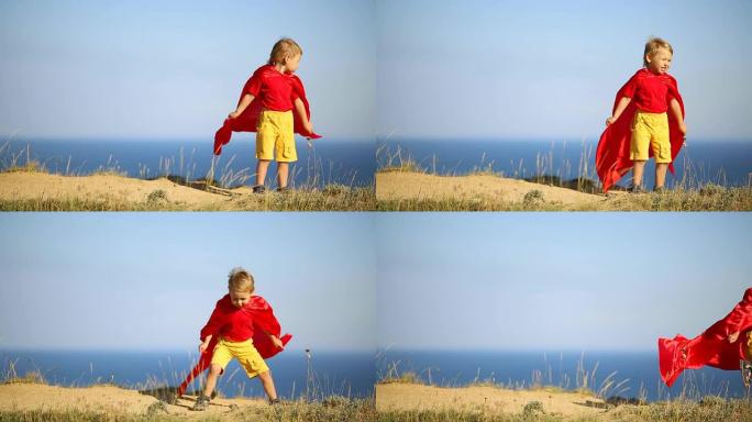 超人男孩在海岸上玩耍