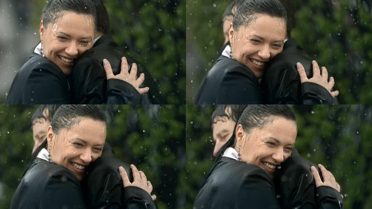 高清超慢动作: 幸福夫妻在雨中拥抱