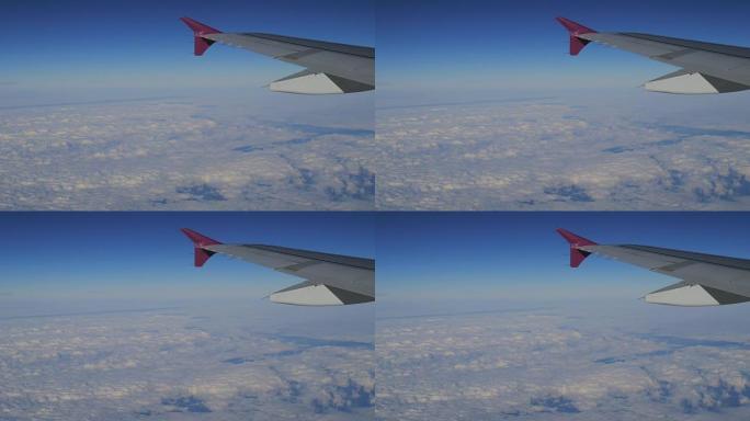 4K: 飞机上靠近窗户的天空和云