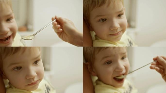 母亲喂养她的儿子