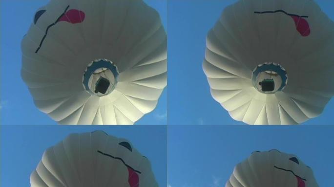 在上升的气球下上升的气球下热气球