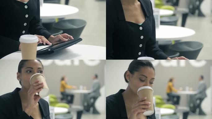 商务女性在平板电脑咖啡馆工作