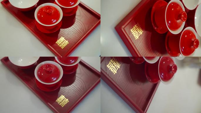 托盘里的红色敬茶茶碗金色喜字