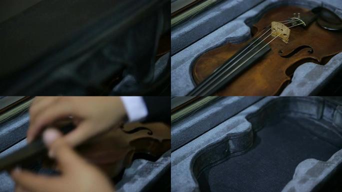 用小提琴打开盒子拿出小提琴