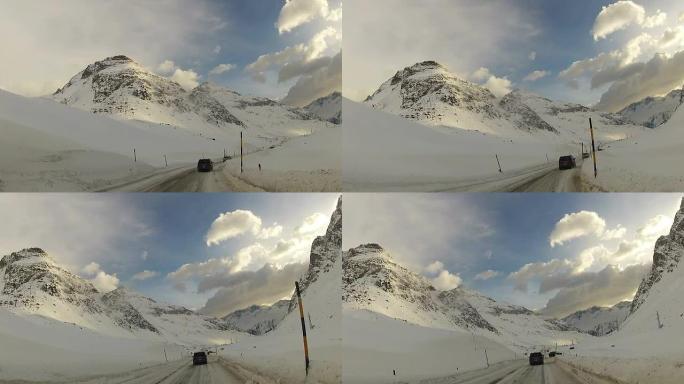 视角，汽车在雪地山路上行驶