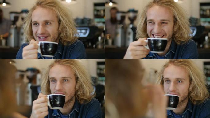 男人在咖啡店和女人喝咖啡