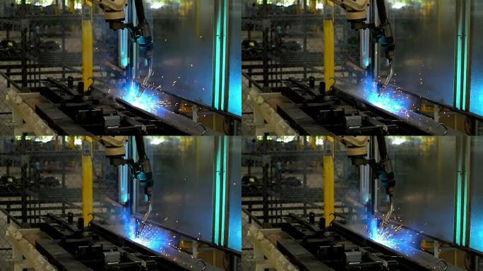 高清: 汽车装配厂焊接机器人运动