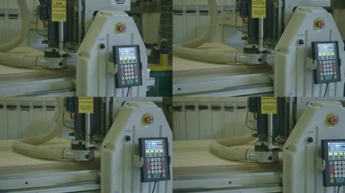 木匠在切割木板的电动电锯上工作