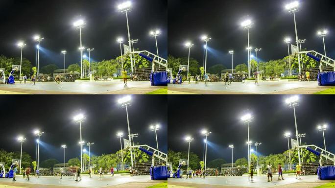 延时：亚洲年轻人打篮球户外夜景