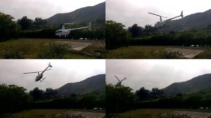 从农村着陆坑起飞的直升机