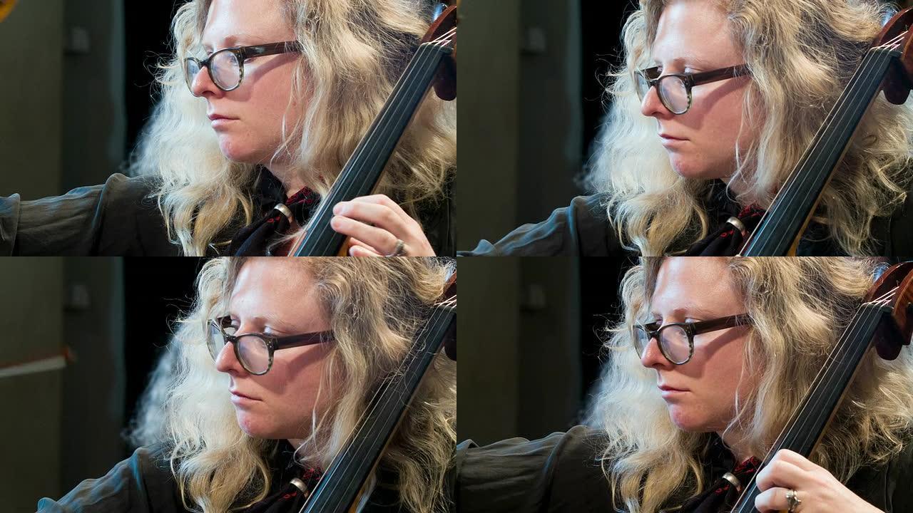 女大提琴手练习专注乐曲家演奏家
