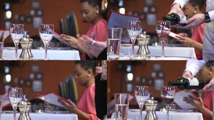 Waiter Pours Wine for Couple - Close Up