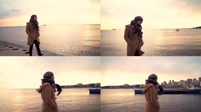 高清: 孤独的女人在海边散步