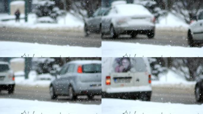 雪暴冬季交通。汽车在湿滑的路上行驶。雪花飘落。