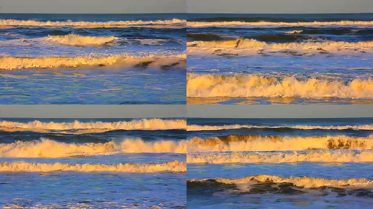 日落时海滩上的大浪