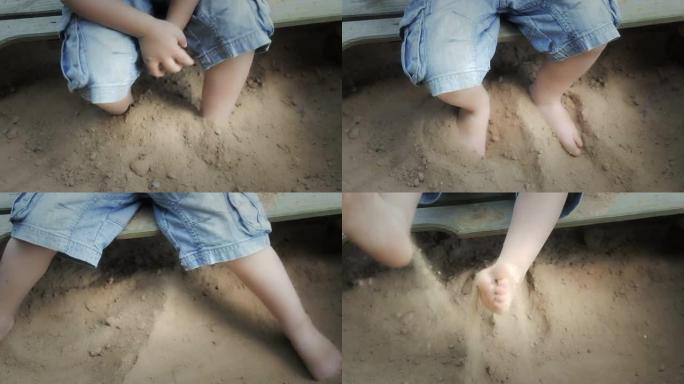 玩沙子的男孩