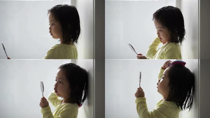 亚洲女性儿童梳头儿童教育小孩照镜子未成年