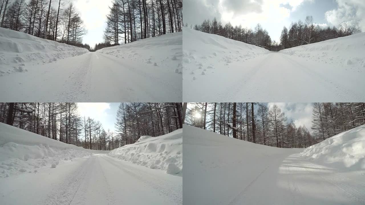 雪地冬季公路行驶冬季大雪冰封道路东北冬天