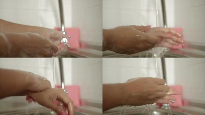 女性用肥皂和水洗手