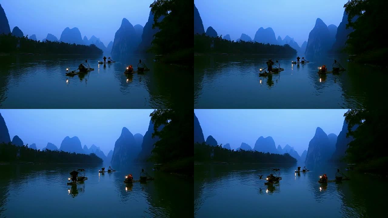 漓江渔夫夜晚打鱼灯笼照明中国山水