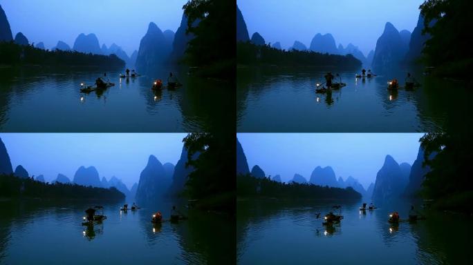 漓江渔夫夜晚打鱼灯笼照明中国山水