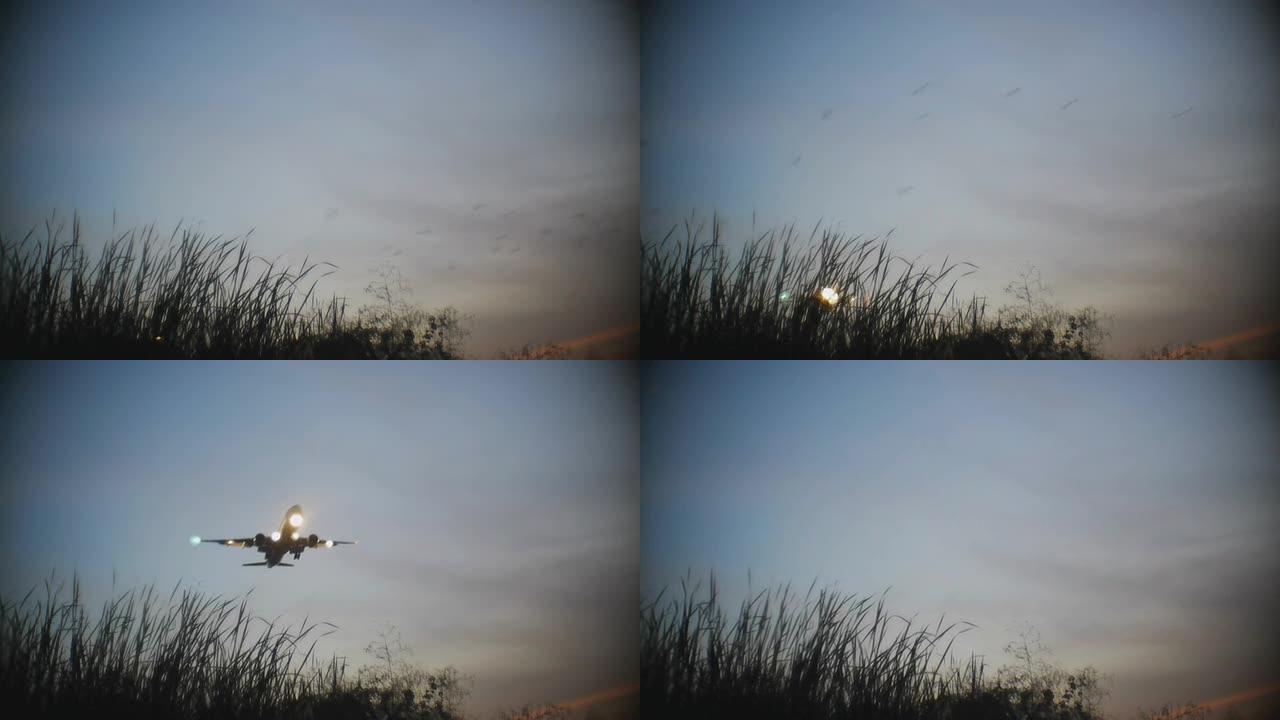 喷气式飞机在黄昏降落。