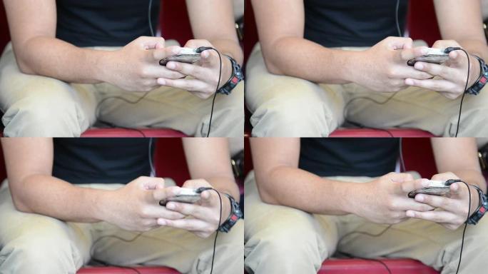男子用手机在室内听音乐