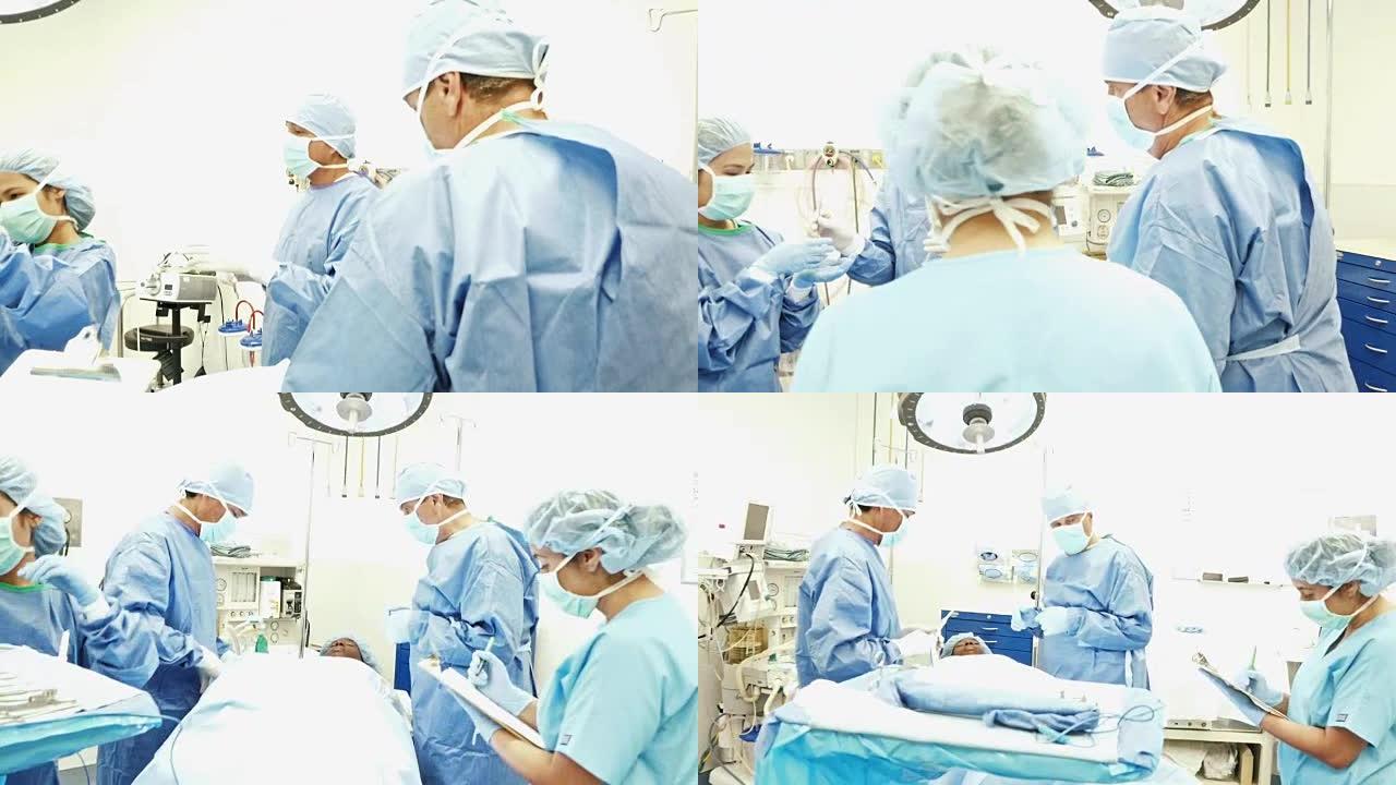 医疗团队为患者在手术室进行手术做准备